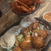 Cauli flower wings, sweet potato fries with vegan craic sauce   at Bootleggers in Belfast