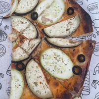 Vegetable pizza without cheese. Ask for extra sauce    at Chalet  in Bukhara