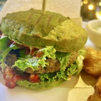 fish burger  at PLANTS Kitchen & Bar in Almaty