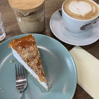 Sahnetorte mit Aprikosendecke; Cappuccino mit Haferdrink  at Cafe Spirit in Siofok