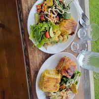 Lasagna, curry mousaka, potato salad, Italian chickpea salad, pumpkin roasted pepita spinach salad and green salad. at Manna Haven in Byron Bay