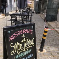 View from end of alleyway. Signage  at Mãe Terra in Portimao