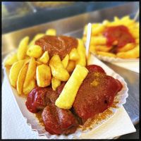 Vegan Currywurst and fries with saté-sauce    at WITTY'S Currywurst - Kiosk in Berlin