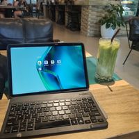 Buen sitio para trabajar. Iced matcha con leche de soja at Naked Espresso in Vang Vieng