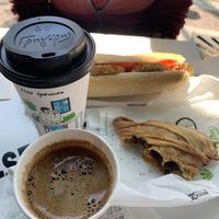 Cappuccino with almond milk, Greek black coffee, vegan baguette and the mushroom pie.  at Gregory's in Kalamata