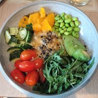 Vegan mango bowl, has honey in it at La Mouka in Prague