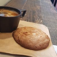 Long black & orange, almond cookie at Origin Coffee in North West London