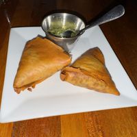 Lentil sambusa with cilantro lime sauce  at Bunna Cafe in Brooklyn