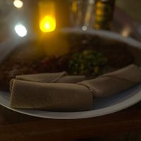 Feast platter with seven curries at Bunna Cafe in Brooklyn