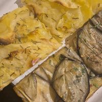 Potato pizza and aubergine at Alice Pizza in Rome