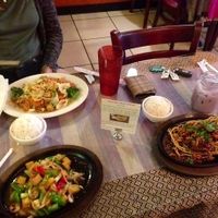 Far left: Pad Thai with veggies & tofu (no egg), near left: Outlaw Tofu (came with rice), right: Thai Time Volcano (a duck entree that came with rice) at Thai Time Cafe in Joplin