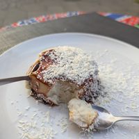 Complimentary dessert... I think it was a rice milk base with date syrup. Super tasty! at Vegano Mezo in Berlin