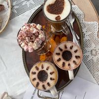 Selection of coffees and a hot chocolate with cream and marshmallows at The Vegan Coffi House in Aberdare