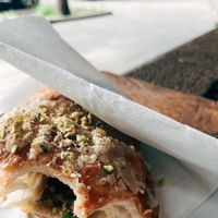 Pistachio croissant   at Massolit Bakery & Cafe in Krakow