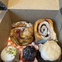 Brioche cinnamon swirl, Cinnabon bun, orange pistachio cake, chocolate cake, pumpkin scone   at Bad Attitude Bread in Toronto