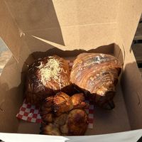 Pizza pastry, coffee croissant, and cinnamon pull apart   at Bad Attitude Bread in Toronto