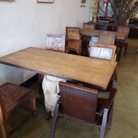 Wooden tables and chairs that are just beautiful and unique. at Falafel King in Denver