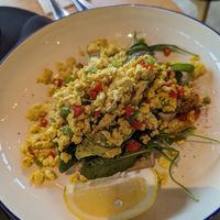 Tofu scramble, usually comes on mushrooms, subbed it with toast. Generous portion. at The Coffee Club in Abu Dhabi