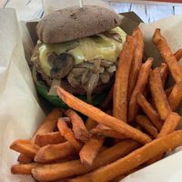 Mushroom Burger, Provolone chez,Grilled portobellos, spinach, tomato, caramelized onions and aioli (with sweet potato fries….Fire at Healthy Junk in Anaheim