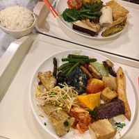 Two nice plates with tasty food and extra rice. (sadly not quite sure if all was vegan though)  at Minder Vegetarian 明德素食 - Eslite Mall in Taipei
