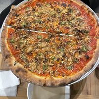 Tomato pizza with mushroom and jalapeño, half vegan.   at Hughes Pizza ヒューズ ピザ in Osaka