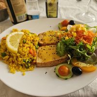 Tofu with orange sauce and brown rice with vegetables. at El Laurel in Salamanca