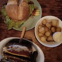 Bun, Ruben sandwich & smokey roast potatoes with aioli. at VÜMO in Porto