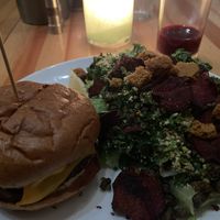 Falafel Smash Burger with a 1/2 kale saladd  at Heirloom in Vancouver