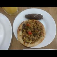 Aubergine esfiha and a vegan kibi at Habib's in Sao Paulo