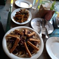 Noods and spiced potatoes at Vegan House Cafe & Restaurant  in Lalitpur