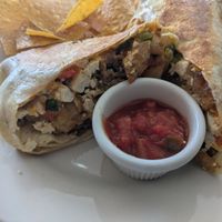 Breakfast burrito, comes with chips and salsa at CRISP in Rochester