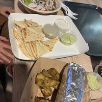 Chicken shawerma bowl, bread and dip mezza (with baba ganoush, tzatziki, and avocado lime), and the beyond kabob wrap    at Koshary Corner in Baltimore
