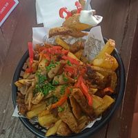 Mushroom, seitan and red pepper loaded papa's fritas at Silvestre  in Coyhaique