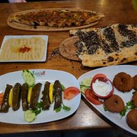 Grape leaves, falafel, hummus, bread, and pide (not vegan, but vegetarian options) at Rumist in Istanbul