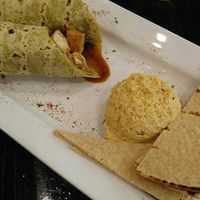 Thai wrap with tofu and a side of hummus. Best food I've had in Alabama. at Sunflower Cafe in Mobile