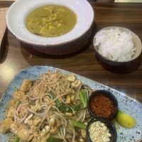 Yellow tofu curry (background) and Tofu Pad Thai (foreground)  at Asian Vegan Kitchen in Istanbul