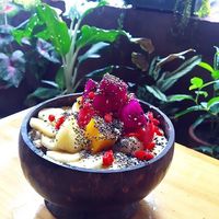 Yellow tropical smoothie bowl at Earth Tone in Pai