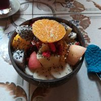 Orange smoothie bowl at Earth Tone in Pai