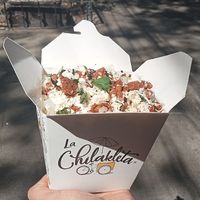 Chilaquiles listos para comer, con proteína vegetal y queso y crema de almendras at La Chilakleta - Félix Cuevas in Mexico City