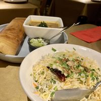 Coconut and lime rice with dosa at the back  at Lavendra in Lavender Bay