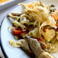 Fried oyster mushrooms with peppers. However, this dish contains a bunch of the huge pieces of half-raw onions and a lot of vegetable oil. There are few oyster mushrooms, and even fewer peppers. I didn't finish it :( at Art Lunch - Nalbandyan St in Yerevan