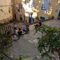Tables on the steps at The Food Temple in Lisbon
