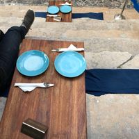 Sitting on the steps  at The Food Temple in Lisbon