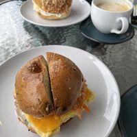 Sour Kisser on a Rosemary and olive bagel (with vegan egg, vegan cheese, and vegan cream cheese)  at Wee Bird Bagel Cafe in Randolph