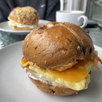 Sour Kisser on a Rosemary and olive bagel (with vegan egg, vegan cheese, and vegan cream cheese)  at Wee Bird Bagel Cafe in Randolph
