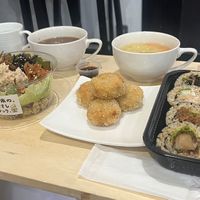Maki sushi combo with Barley miso soup (right) and Chirashi-Sushi & Maki-Sushi combo with Hatcho miso soup (left). Chickpea croquette in the middle  at Brown Rice Sushi TEC 玄米のおすしテック in Osaka
