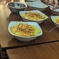 Tumeric sticky rice with mung bean at Onetrip with Local in Hanoi
