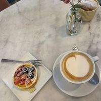Fruit tart with oat cappuccino   at Nepá in Milan