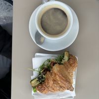 Savory croissant and americano   at Nepá in Milan