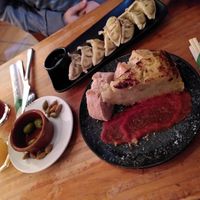 Gyoza and tortilla, with delicious Linda pear juice at Viva Chapata in Madrid